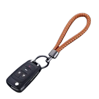 Vintage Handcrafted Metal Keychain with Rope Accents