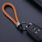 Vintage Handcrafted Metal Keychain with Rope Accents